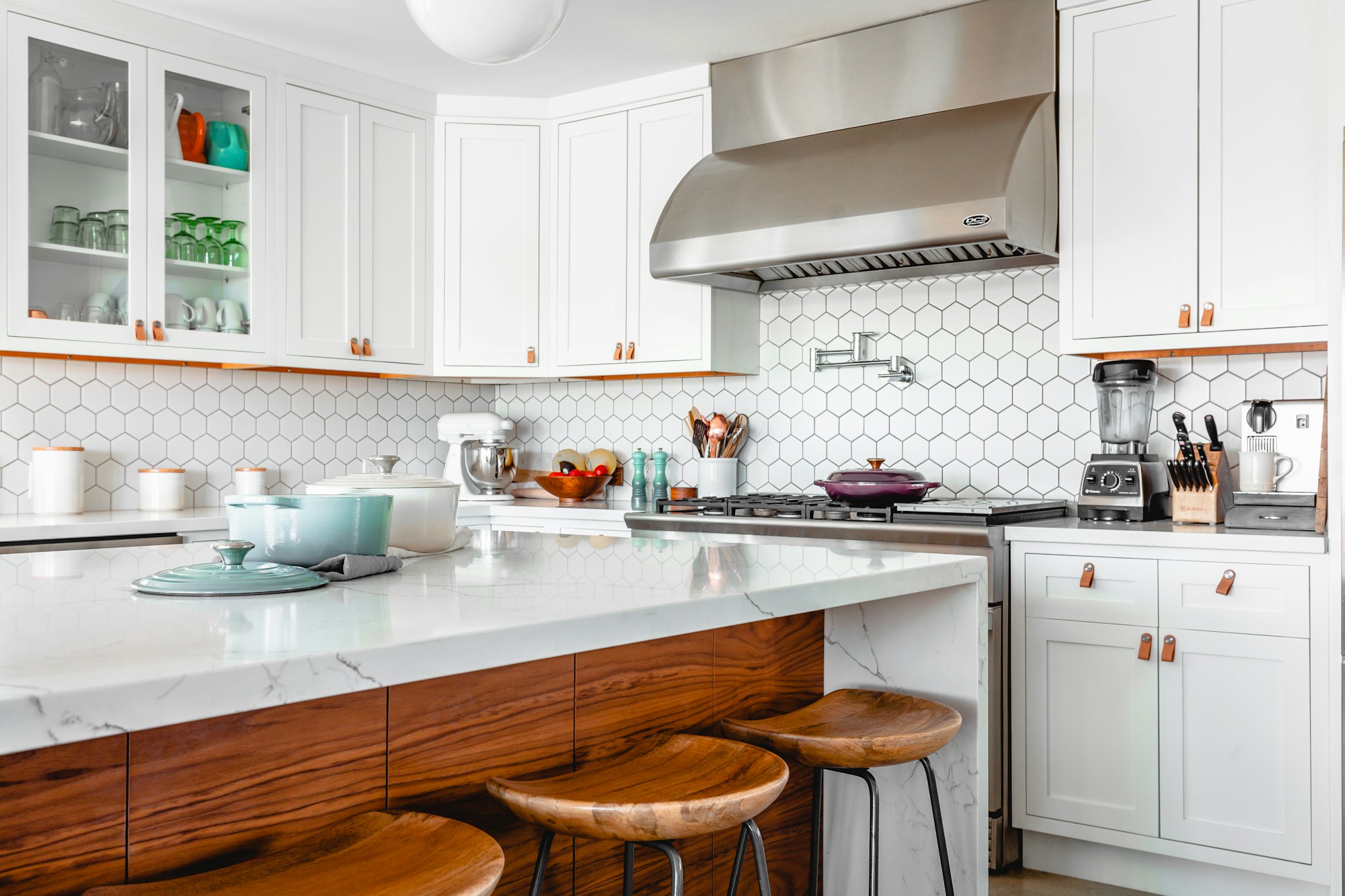 Design inspiration: a kitchen with white cabinetry and a large island